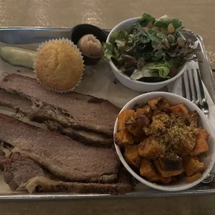 Brisket, sweet potatoes, salad, cucumber and cornbread.