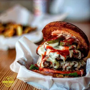 a cheeseburger in a basket
