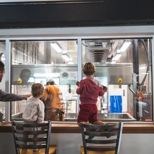 Observation window into the cheesemaking room