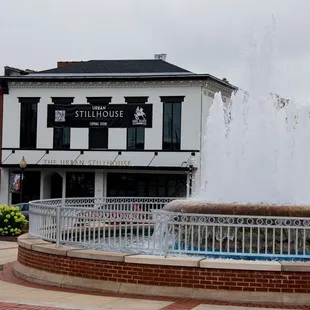 a fountain in front of a building