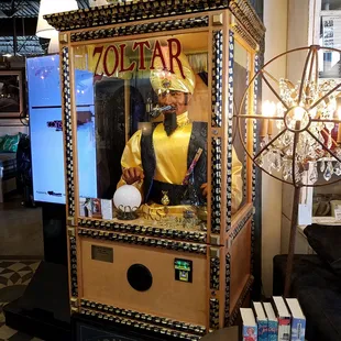 Zoltar tells your fortune for a fee