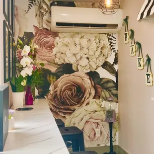 a floral wall mural in a kitchen