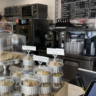 The chalkboard menu shares the fair bakery pricing for quality products created by Tracy.