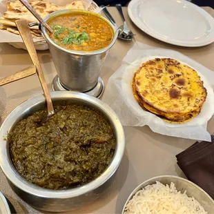 a variety of indian food on a table
