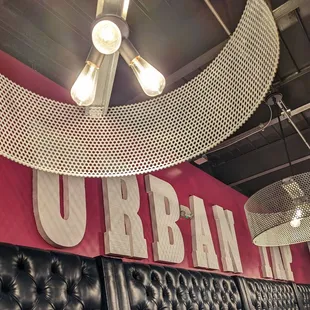 a large sign and a chandelier