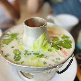 a bowl of soup on a plate