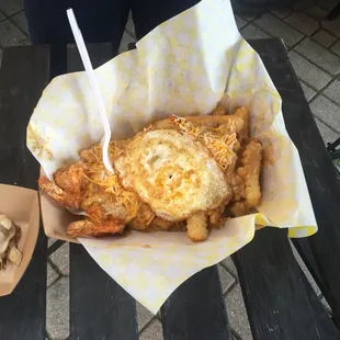 Low Bay Poutine: andouille sausage gravy, shrimp, corn, peppers &amp; crab over fries