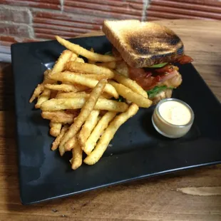 BLTA with an egg and truffle fries...