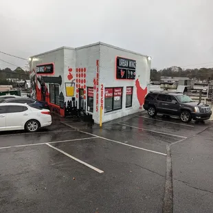 two cars parked in a parking lot