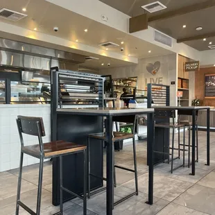 Inside they have high top tables as well as regular size tables