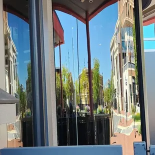 Reflection in the revolving door--main entrance