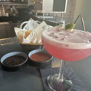 Prickly pear margarita and complementary chips and salsa