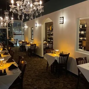 a dining room with a chandelier