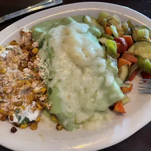 Avocado Enchiladas (steak fajita inside) w/ veggies and street corn. Delicious!