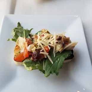 Mediterranean bruschetta on warm sour dough. Yum!