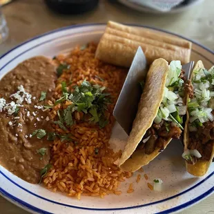 Three item combo with two tacos and a chimichanga