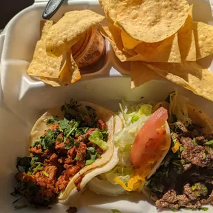 Carne asada and al pastor tacos