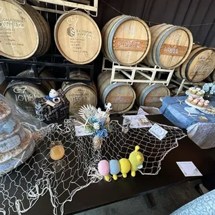 a table with a bunch of barrels