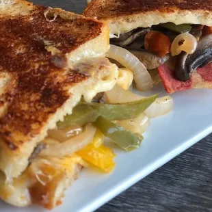 Loaded grilled cheese sandwich available every Wednesday.