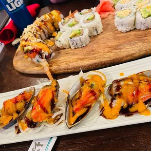 a platter of mussels and shrimp