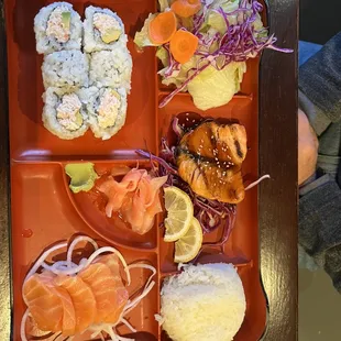 Deluxe Bento Lunch - teriyaki salmon, California Roll , and salmon sashimi