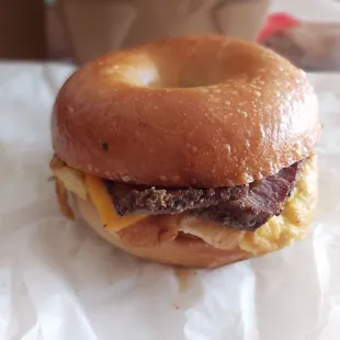 Pastrami, egg,cheese, bagel sandwich