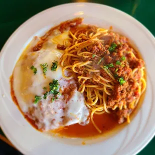 Chicken Parmigiana with spaghetti and meat sauce