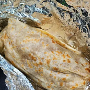 a burrito wrapped in foil