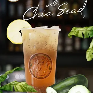 a cold drink with cucumber and a slice of lemon
