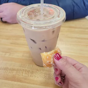 Iced coffee (med) and half of the donut hole