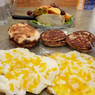Traditional two-egg breakfast with turkey sausage and English muffin.