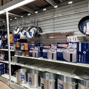 pots and pans on shelves