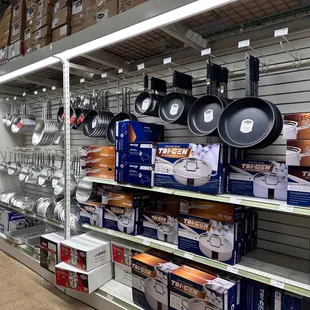 pots and pans on shelves