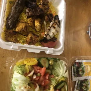 Mix Grill Kabab &quot;Chicken, Lamb, Beef&quot; meal with a large garden salad.