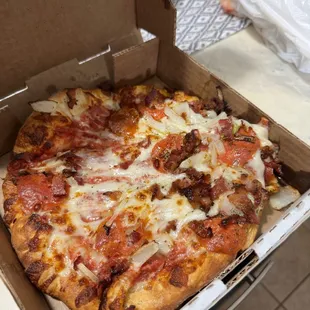 a pizza in a pizza box