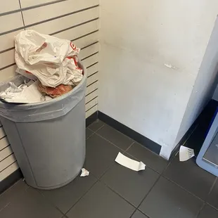 Guess the trash was not a priority after closing. Eek!! (Also, this was the LEAST full trash.) the place was a mess.