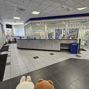 Long counter for completing paperwork. The gift shop is blocked off