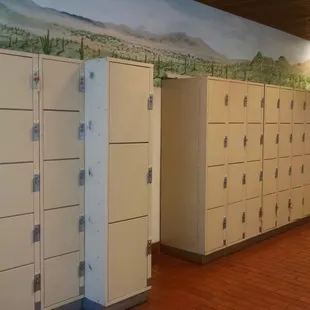 Lockers for PO Box people whose packages won&apos;t fit into their normal box. Just like bus terminal lockers, an orange key appears.