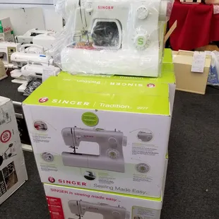 Brand new Singer sewing machine for $229 + tax. There were 8 machines in boxes