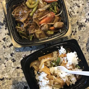 Drunken noodles with veggies (above) and pad kaprow with tofu (below).