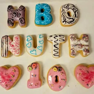 a variety of decorated doughnuts