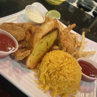 Fried Shrimp with Mexican rice and crispy fries.