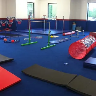 Our facility features a large preschool gymnastics area with smaller, interactive equipment.