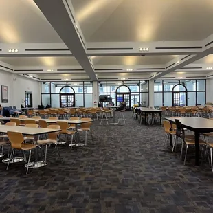tables and chairs in a large room