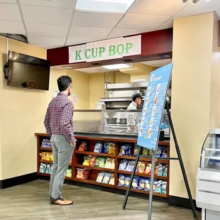a man standing in front of the counter