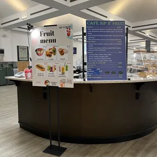 a counter with a menu on it