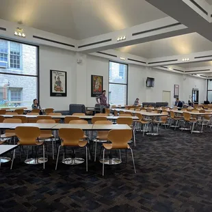 tables and chairs in a large room