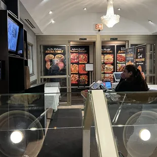 a woman sitting at a counter