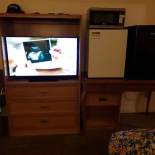 Very outdated ugly room furniture... two mini fridges!!!