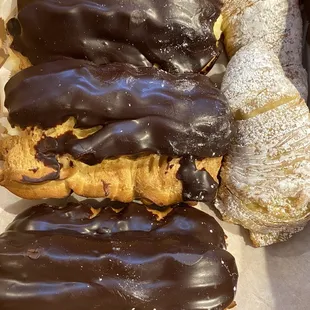 Chocolate eclairs filled with pastry cream, Sfogliatella